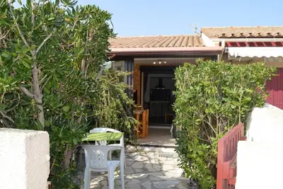 Image de Maison climatisée 2 pièces/mez, 5 couchages, proche port et plage, parking, véranda, terrasse, animaux Ok