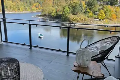 Image de Apartments- Saaldorf Wg 6 with balcony and view of the reservoir