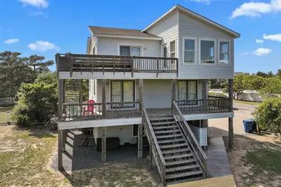 Just one lot from the ocean with private pool!