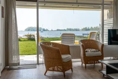 Image de Fantastic apartment, with a large garden. on the water, brilliant view,
