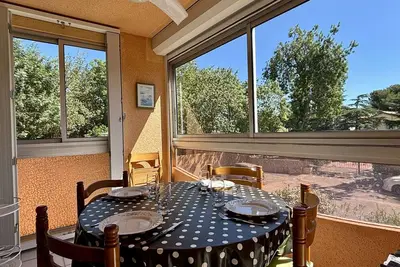 Image de Appartement cosy à 100m de la plage avec piscine, parking privé et loggia vitrée