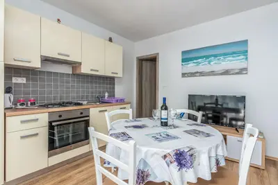 Image de Appartement de vacances avec vue sur la mer et air conditionné