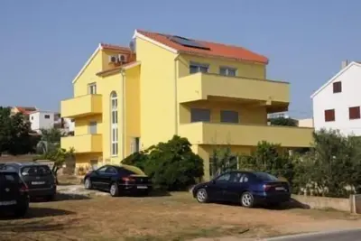 Image de Appartement de vacances Vodice pour 1 - 9 personnes avec 3 chambres à coucher - Maison mitoyenne