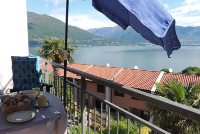 Image de 2-room apartment with balcony and beautiful lake view