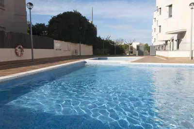 Image de Appartement spectaculaire avec piscine commune et vue sur le port