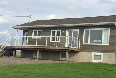 Image de Main Floor (Unit 1) in House, Deck, Sunset, Water View (Cheticamp Harbour)