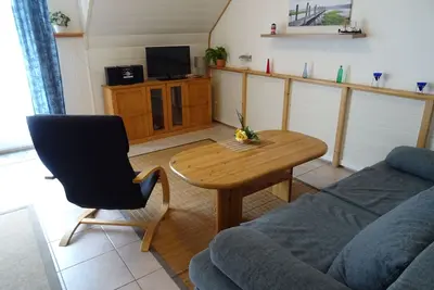 Image de Apartment SEERÄUBER in a quiet location, balcony, only 300m to the green beach