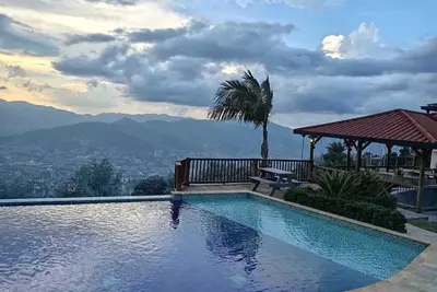 Image de Six bedrooms immaculate luxurious Villa with pool and private cascade