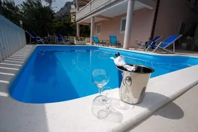 Image de Appartement de vacances Mimice pour 1 - 5 personnes avec 2 chambres à coucher - Maison mitoyenne