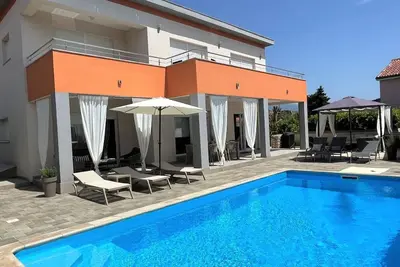 Image de Maison de vacances Barbat na Rabu pour 1 - 9 personnes avec 4 chambres à coucher - Maison de vacance