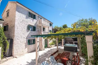 Image de Maison de vacances Sumartin pour 1 - 9 personnes avec 4 chambres à coucher - Maison jumelée