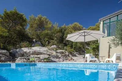Image de Appartement de vacances Krvavica pour 1 - 8 personnes avec 4 chambres Ă coucher - Maison de vacances