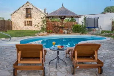 Image de Maison de vacances Bogatic pour 1 - 9 personnes avec 5 chambres Ă coucher - Maison de vacances