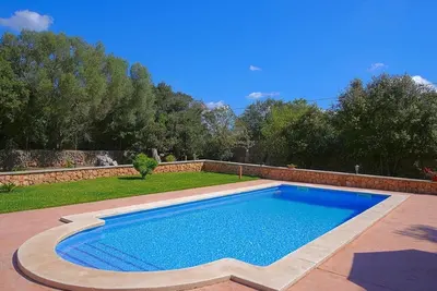 Image de Maison de vacances Son Garbi avec vue sur les montagnes, Wi-Fi, A/C, piscine, jardin, terrasse et balcon