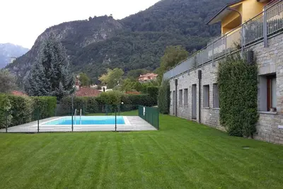 Image de \"New Eleven Apartment\" sur le lac de Côme avec vue sur le lac, piscine, Wi-Fi et terrasse