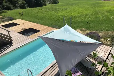 Image de Maison en bois avec piscine privée chauffée, terrasse et jardin - Ideal famille et nature