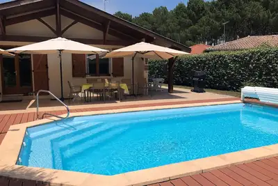 Image de Maison Moderne à Messanges avec Piscine Chauffée, Proche Plage, Idéale Famille, Classée 3***