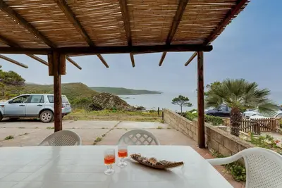 Image de Appartement de vacances \"La Vista di Mondo\" sur la plage avec vue sur mer, terrasse et jardin