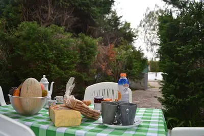 Image de Maison de vacances avec espace extérieur équipé à Torre dell'Orso