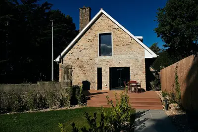 Image de Maison mitoyenne dans un parc en bord de mer - avec accès direct à la plage