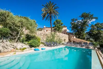 Image de Finca rurale dans la montagne d'Es Rafal avec piscine