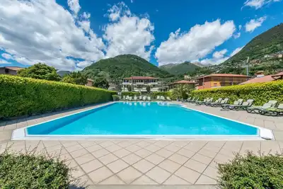 Image de Appartement Bilocale avec piscine, Wi-Fi, balcon, jardin et terrasse