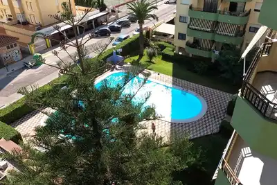 Cozy apartment on the Beach with pool and tennis. Ideal family trips.