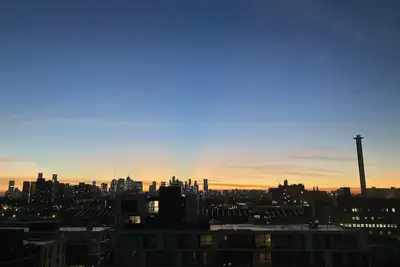 Image de Cozy, cute apartment 15 min from Melbourne Cbd - City view!