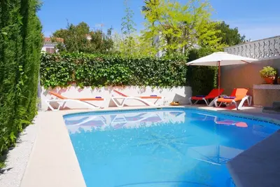 Image de Maison de vacances 'Ca Na Cati' avec Wi-Fi, climatisation, piscine, jardin, terrasse et balcon.