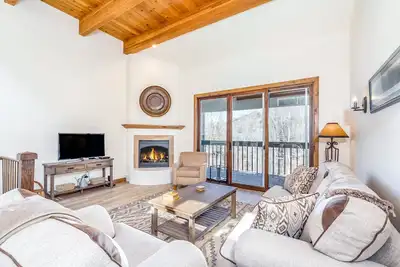 River-view condo with fireplace & hot tub - walk to gondola & Main St