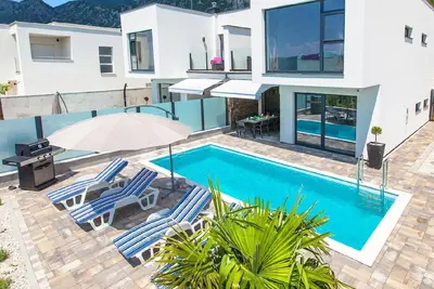 Image de Maison de vacances Grižane pour 2 - 8 personnes avec 4 chambres à coucher - Maison de vacances