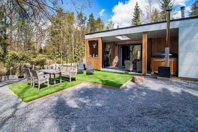 Image de Maison de vacances א Biron avec sauna tonneau