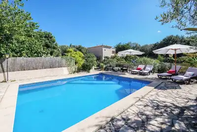 Image de Maison de campagne Can Jaume avec connexion Wi-Fi, piscine, jardin et terrasse