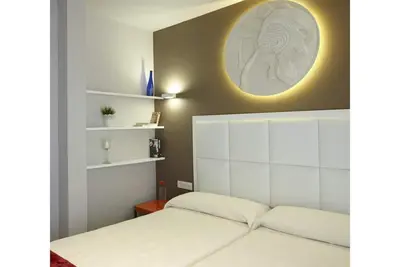 Image de En centre ville avec parking gratuit et cour