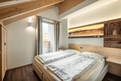 Image de Résidence Corn - Appartement supérieur \"La Scofa\" avec vue sur la montagne, jacuzzi, Wi-Fi et balcon