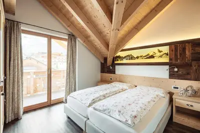 Image de Résidence Corn - Appartement supérieur \"La Ciasotta\" avec vue sur les montagnes, jacuzzi et Wi-Fi