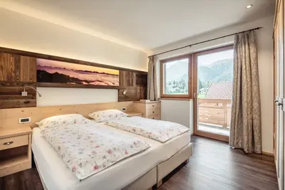 Image de Résidence Corn - Appartement supérieur \"Le Tama\" avec vue sur les montagnes et jacuzzi
