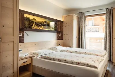 Image de Résidence Corn - Appartement supérieur \"Le Tablé\" avec vue montagne, jacuzzi, Wi-Fi et balcon