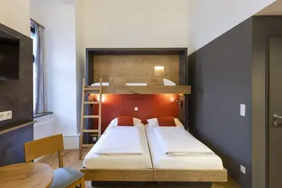 Image de Vierbettzimmer, Halbpension - Jufa Hotel Pyhrn-priel