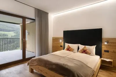 Image de Appartement \"Archehof Hochzirm Lodge Johanna\" avec vue sur montagne, sauna et terrasse