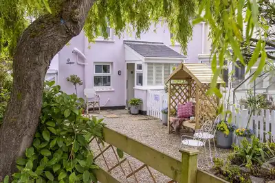 Image de Pink Cottage is a charming and traditional cottage
