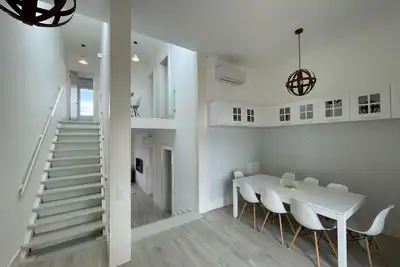 Image de Beautiful penthouse apartment with terrace - 4 minutes walk to the beach