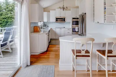 Image de Traditional-style home with private pool, back deck, ample natural light, . . .
