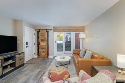 Summer's Edge | Spacious master with fireplace, hot tub access, parking