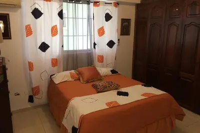 Image de Caribbean Apartment. Downtown Ciudad. 5 Minutos del Mar. Estacionamiento Seguro