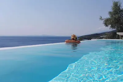 Image de Whole villa # for 4 adults + 4 children - panorama sea view with pool