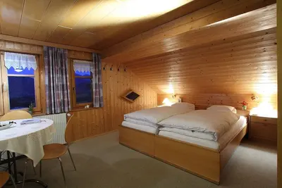 Image de Gemütliches Appartement mit Viel Holz und Direktem Blick auf die Berge