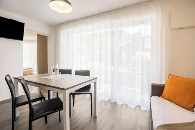 Image de \"Appartement Treï Résidence Bun Sté\" avec vue montagne, bain à remous, sauna, Wi-Fi et balcon