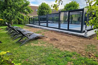 Image de Maison 12 personnes avec piscine couverte chauffée 7min de Cabourg
