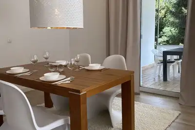 Image de Elegant apartment with balcony and outdoor seating area with two parking spaces